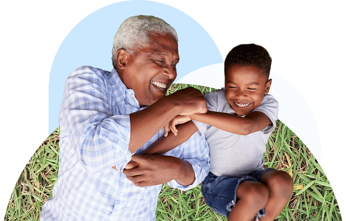 Grandfather and grandson laughing together
